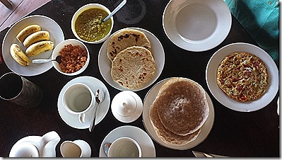 (from left) bananas, pol sambal, dhal curry, coconut roti, rice hoppers, vegetable omelette